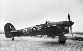 Credit: https://commons.wikimedia.org/wiki/File:Hawker_Typhoon_Mk_IB_loaded_with_rocket_projectiles_and_fuel_tanks.jpg